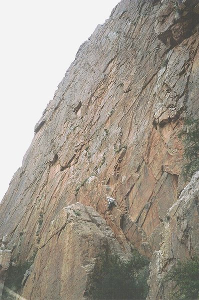 Massive unclimbed crags and walls such as this are found all over the Anti-Atlas mountains . Here Andy Ross takes off on what turned out to be a 5.10 climb.