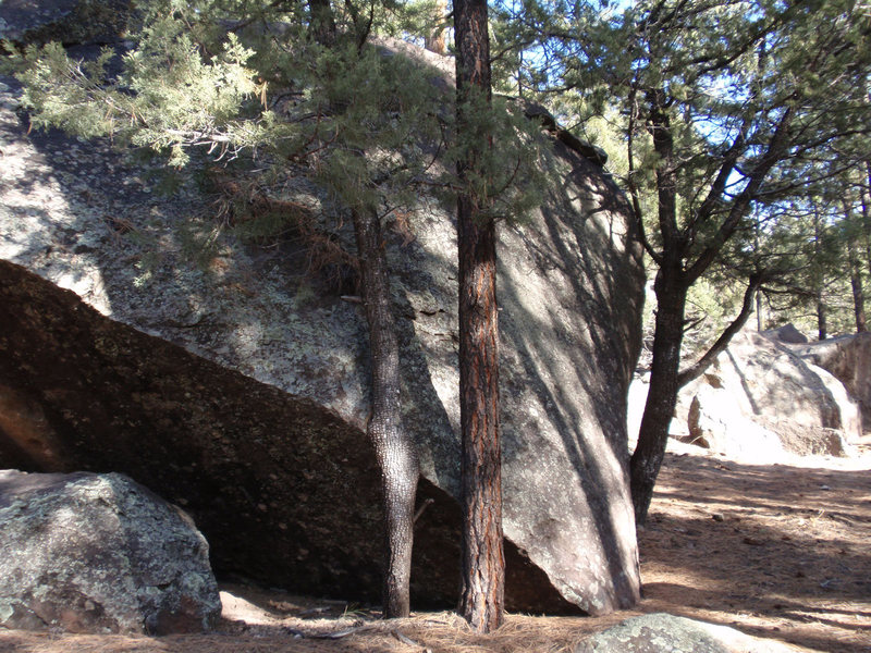 The first boulder as seen from the car.<br>
<br>
The tall slab between the trees is nice.