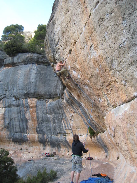 A German climber struggles to rest after the end of the primary difficulties.