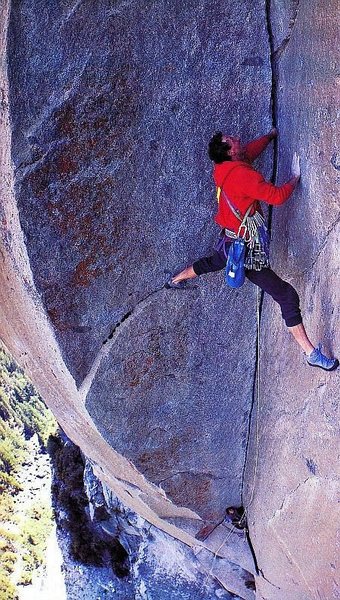 Werner Braun running it out on Astroman (5.11c), Yosemite Valley<br>
<br>
Photo by Charles Cole