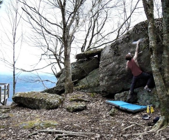 warming up on "Bi-Lingual" at the starting overlook at the Listening Rock Trail Boulders