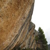 Part of the right end of Espadelles.  The climber (in black) is on "Toni Kaneloni", 8a+.