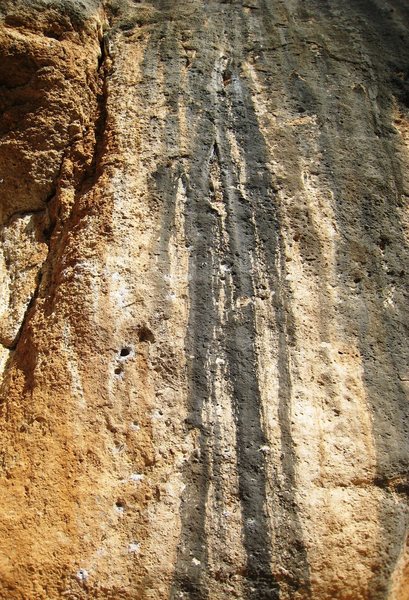 El Sistema climbs in from the left then follows the beautiful gray tufa streak.