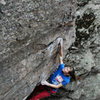 Fun big moves on jugs turn the lip of the overhang before the technical arete.