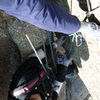 Randy Harris taking a photo down through roof at belay. Belayer, Douglas Lossner. Artemis Vendemmia climbing.