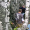 Chris doing the crux dyno on the FA of Rock Biter V7, 