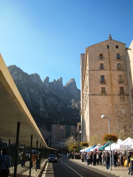 The bustling Monastery, with the Gorros formations high above.