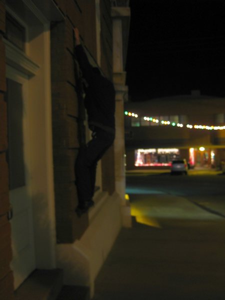 Some man I don't know buildering on a bank somewhere in AZ. late at night. ; /