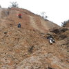 Climbers on P2 of "Harvey" (left) and P1 of "The Serpent" (right), on a busy day at Echo Cliffs. 