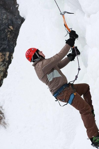 Close up shot of Sam climbing steep ice on the left side of Bridalveil Falls