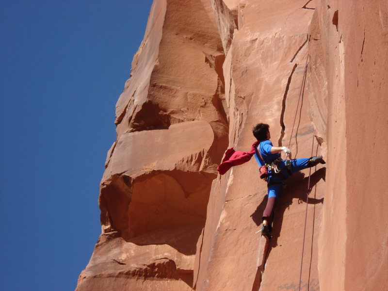 Scarface, 5.11, Indian Creek, Utah, while wearing a Superman costume.