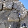 Tai Devore FA-ing crux pitch 5, belayed by Jeremy Freeman