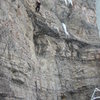 Brad G having cleared the crux roof. MT on belay. Pic taken 12-07?