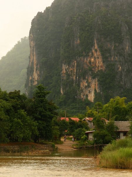 The west village of Vang Vieng with the main climbing area in the background.