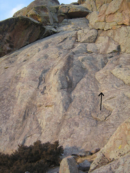 Sugar Mountain climbs the low angle slab up to where the large, left-facing corner systems leans in, and ascends the corner through the easy roof above.