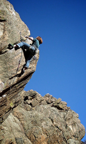 Luke Childers on the F.A. of "Spinner Bait."  Powering out the last upper crux arete section.  Fun line.<br>
<br>
Photo by:  Jaime Childers.