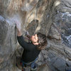 Darren looking fly on the fun sloper rail traverse.<br>
-photo by anonymous flyboy.