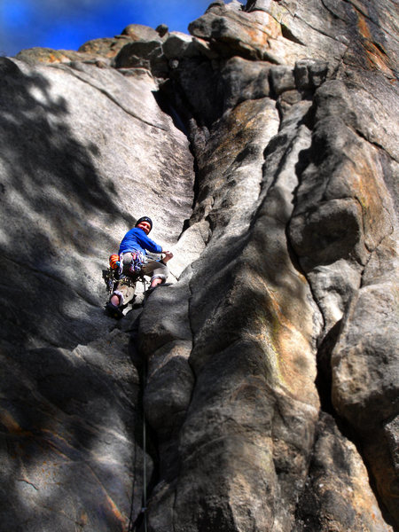 Stan loving the cold January friction... and the icy fingers on "Curving Crack."  One of the many great "Castle Rock" sandbag classics. Boulder Canyon, Co. <br>
<br>
I think Stan really likes it....