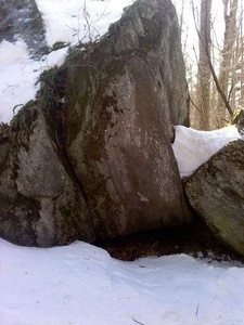sorry about the poor picture quality, but this climbs the center boulder. That route starts just left of the V of snow.