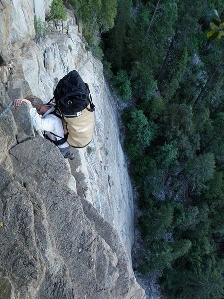 uber scary "4th class" traverse to the start of the climb.  the most frightening part of the climb in my opinion.  Scott carrying the pig