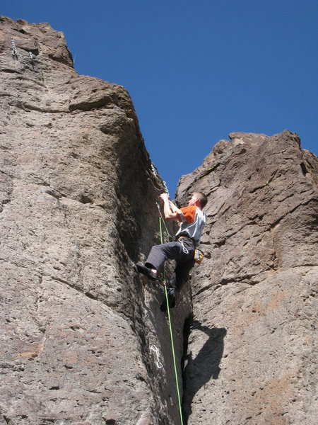 Jason starting the committing crux at the end of the route, just before completing his redpoint. He sent it despite Z-clipping on each of the last 3 closely spaced bolts. 2/2010