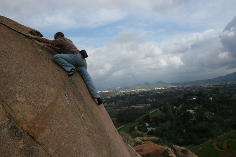 Nathan on a climb near the trail up on the North side. Just right of a thin crack.  2-21-10