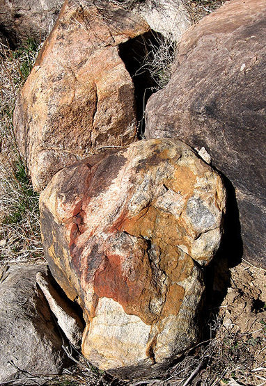 More oddly colored rocks in the drainage below The Larry Flynt Boulders.<br>
Photo by Blitzo.