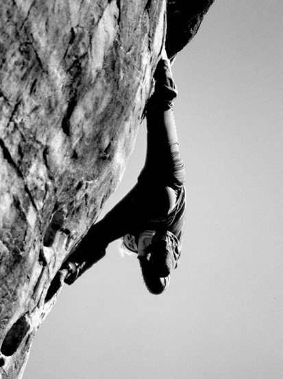 Lynn Hill resting off a heel hook.<br>
Red Rocks 1981.