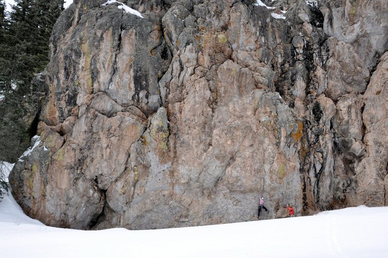 Working into the crux of Mr. Dubious. March 2010. It looks like she's barely off the ground but the snow was drifted up about four feet high but a small trough at the wall's base was snow-free. 