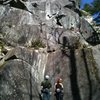 Below the Great Northern Slab, looking up at Libra Crack near the top center.  Most of the climbing takes place above Libra Crack.