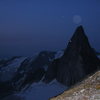Snowpatch Spire and the moon from the shoulder of Bugaboo Spire