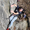 Jakob on the big rounded flake at the start of the crux...