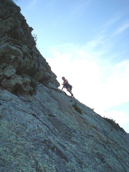 Floyd Hayes traversing below the roof of pitch 3. Photo by Cheri Ermshar.