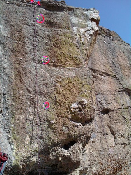 Genghis Khan is the 3 bolt line up to the anchors.  Kublai Khan is the narrow climb to the right (left hand clips), avoiding the arete.  