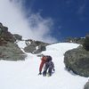 Peeking around a corner to check out an ice bulge high in Yale Gully.<br>
<br>
Photo by Courtney Ley.