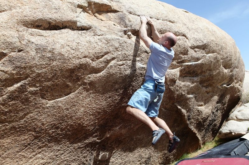 Campusing the rail on Tips Be Gone Traverse, V7