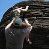 On one of the taller boulders.