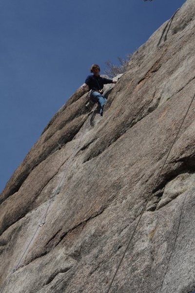 Toping out on an onsight ascent.