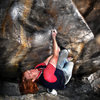 Luke Childers pulling into the crux section of "Wisdom (V7)."