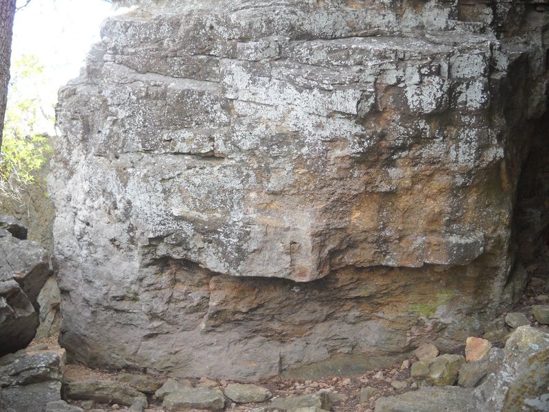 This scrappy little boulder has 3 or 4 routes with a large section in the center that has not been bouldered yet.<br>
Up for some V8?