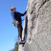 Standing on the dyke at the start of the route. The crux looms above!