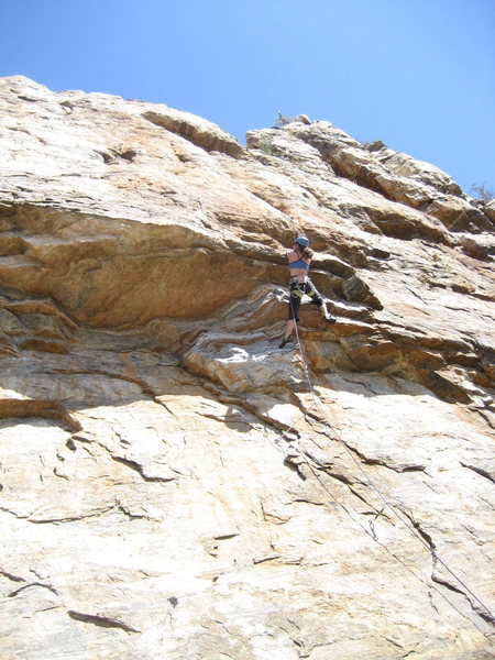 Erica Bigio working the crux.