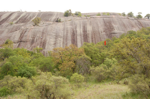 Stranger starts near red mark on right. Small ramp mid wall starts the right angle to the light spot in dark streak. This is the rap anchor. **Climber on Ripple**