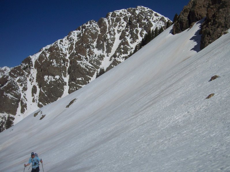 Andy skinning with Mt. Irving behind.