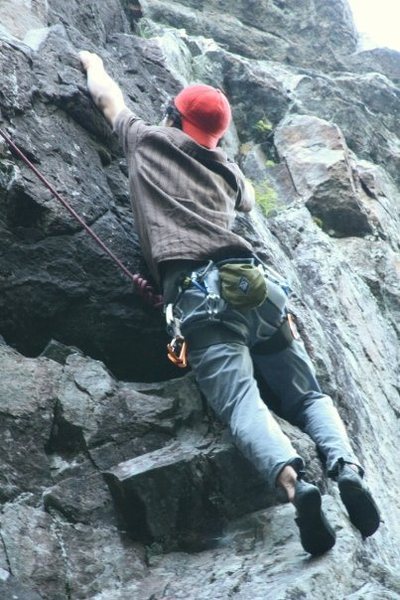 Myself at the top crux of "Flying Gumbies" 5.10b