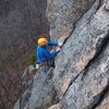 Jamie McNeill pulls the crux overhang on <em>Carpenter & Das</em>.