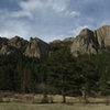 Part of Lumpy Ridge. From left to right: The Pear, The Citadel above that, Lens Rock (the small one between), The Bookend (left center), then the Bookmark separated by a sharp gully from the Book on the right.