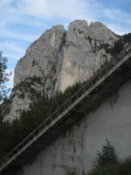 View of the Trois Pucelles from the 1968 Olympic ski jump.  The traverse follows the skyline of the formation from the top right, across the Grande Pucelle to the Dent Gérard