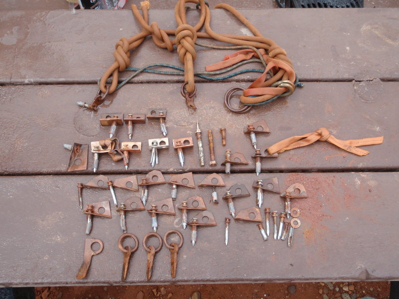 Here are some of the old bolts and pitons we replaced. More than one third of these bolts we're pulled out with just a quickdraw and a tug.