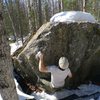 Todd Helgeson warming-up/FA'ing, on In the Trench V3, at the Frostbite Boulders, AK.